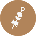 A cocktail spear icon with cheese, onion, and olive on it
