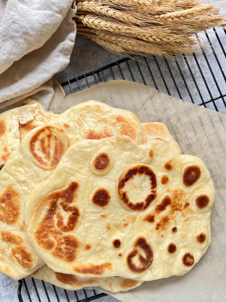 Homemade Naan on parchment paper