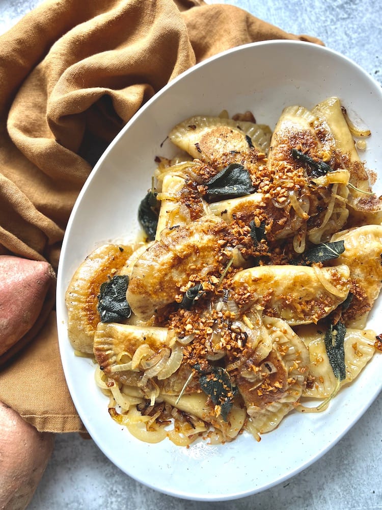 Sweet Potato Pierogi in Brown Butter Sage Sauce in serving dish