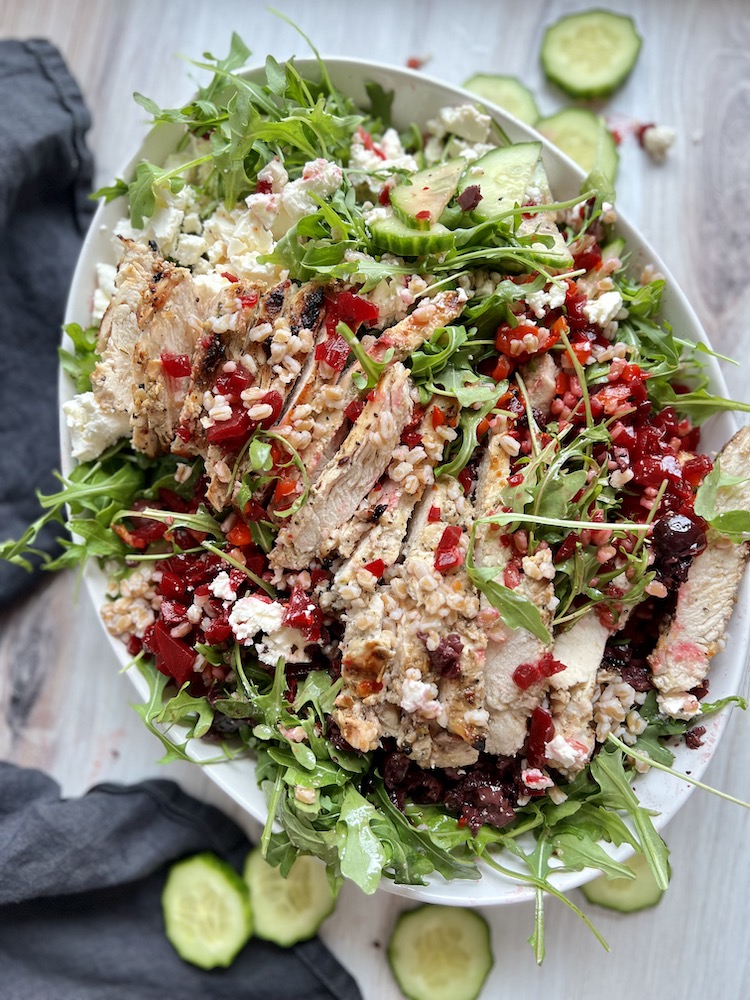 Greek Farro Salad with Chicken in a large serving dish