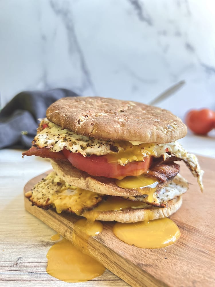 Crispy Feta Fried Eggs Sandwich on a cutting board