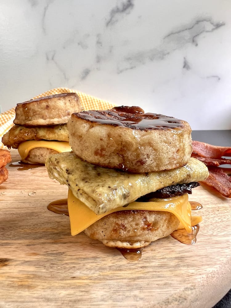 Sausage and Egg Pancake Sandwich on a cutting board