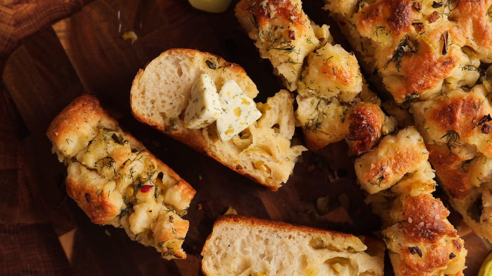 Dill Pickle Focaccia on a cutting board