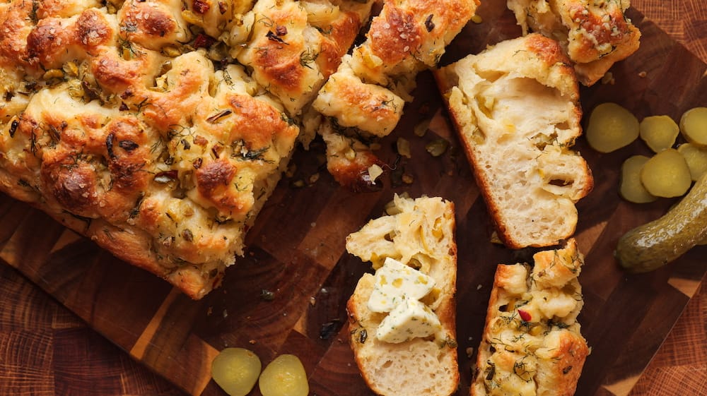 Dill Pickle Focaccia on a cutting board