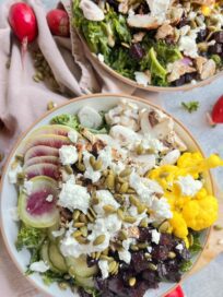 Fall harvest salad with curried cauliflower in a bowl